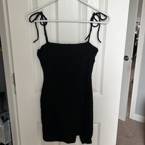 Size 4 Princess Polly black, tight mini dress with a slit